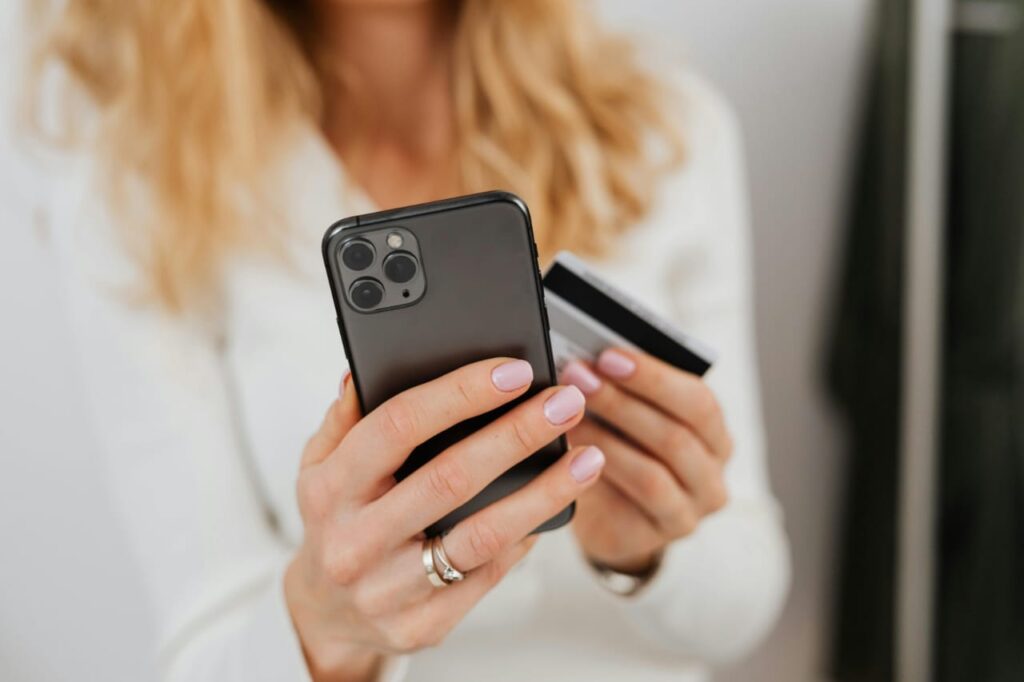 Young adult using credit card smartly for expenses