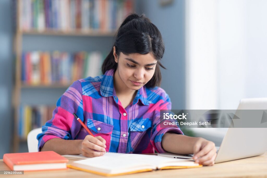 Study table with notes and books for NIOS 2025 exams
