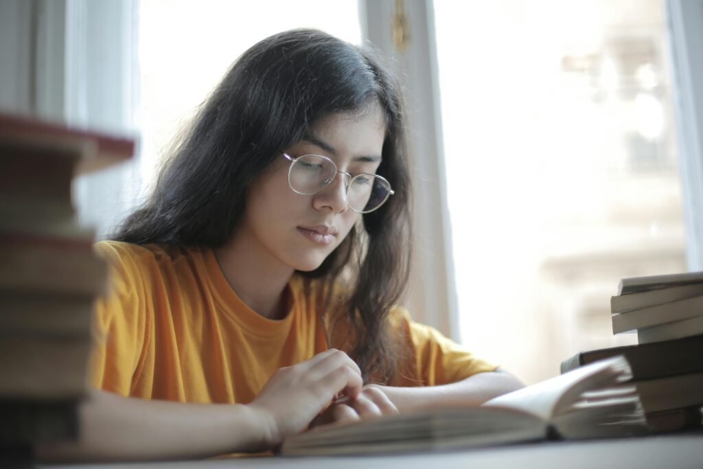 "A candidate revising notes intensely before NMAT 2025