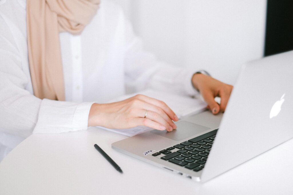 Student using Apple MacBook Air EM4D at a modern workspace